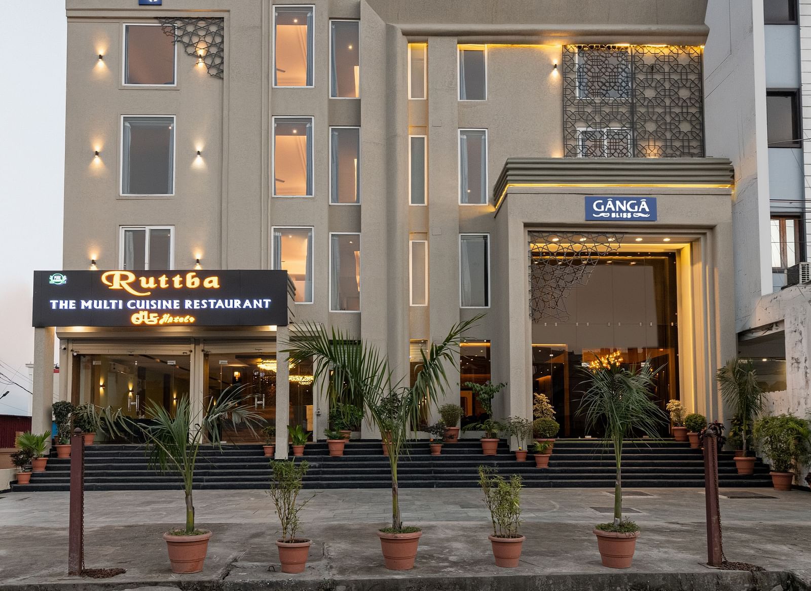 A facade image shot from the front of DLS Ganga Bliss, Haridwar with a clear sky in the background
